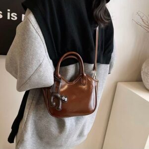 Cross-body bucket bag