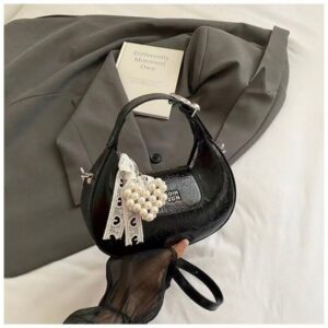 Handbag and cross-body bag
