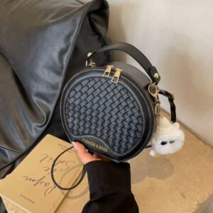 Hand-held small round bag