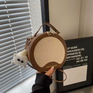 Hand-held small round bag